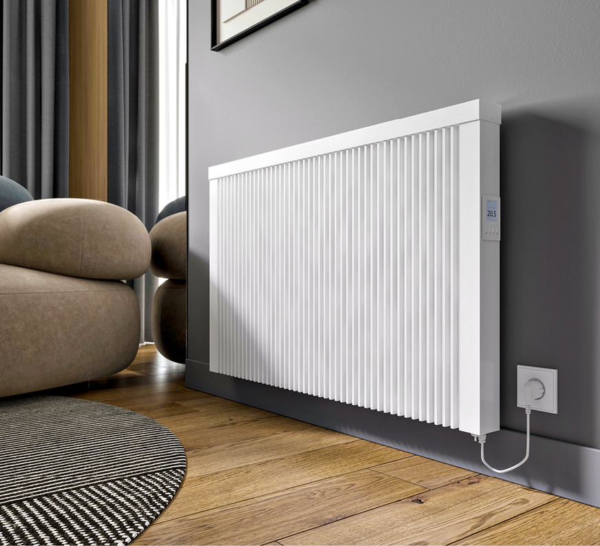 Einbau eines elektrischen Heizkörpers im Wohnraum.
