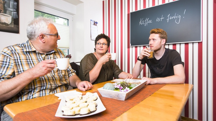 Bei Infrarotheizungen verschwinden die Heizflächen optisch aus dem Interieur. Hier ist sie als beschreibbare Wandtafel ausgeführt.